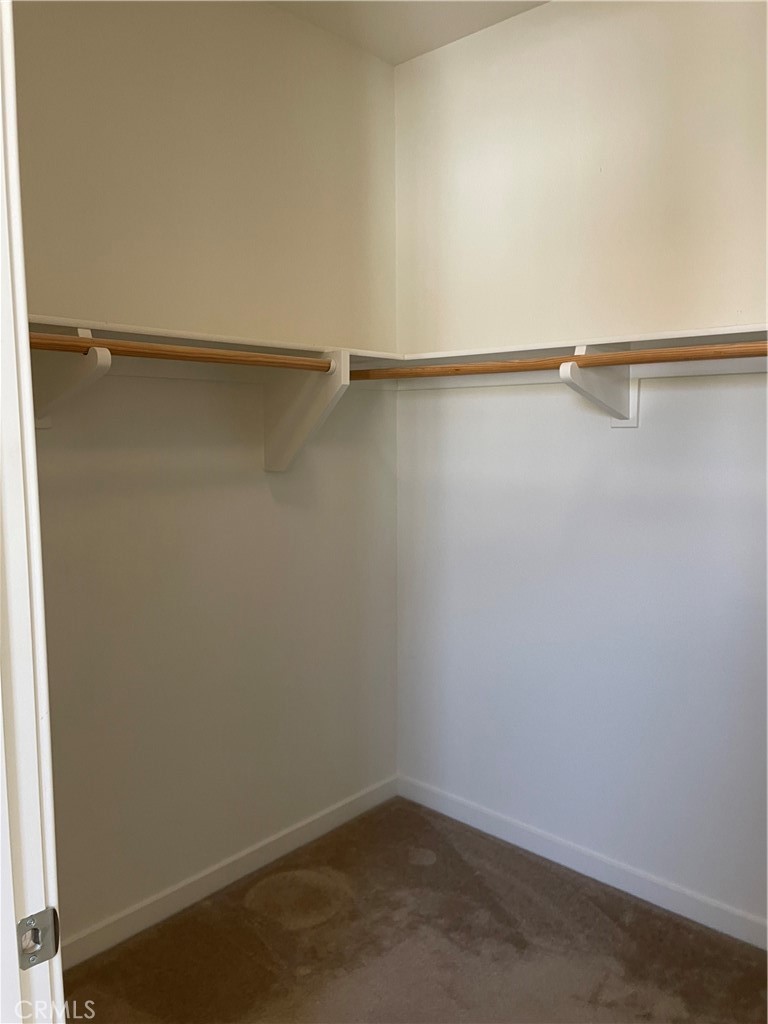 609 Trailblaze Irvine, CA 92618 - Photo 22 of 29 a view of small space with racks on the wall