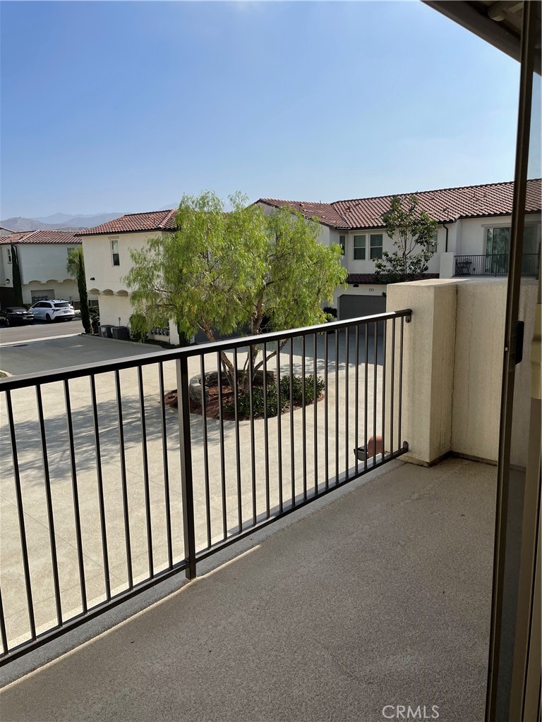 609 Trailblaze Irvine, CA 92618 - Photo 24 of 29 a balcony with an outdoor space