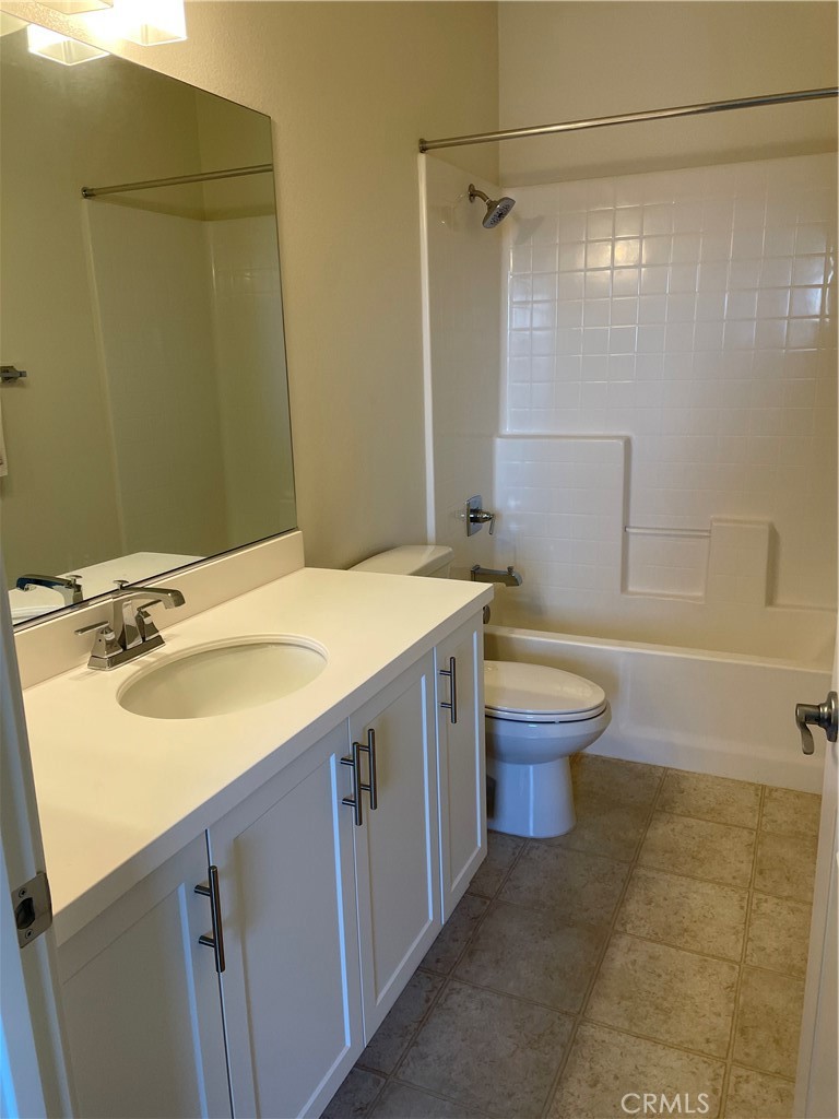 609 Trailblaze Irvine, CA 92618 - Photo 26 of 29 a bathroom with a sink toilet and shower