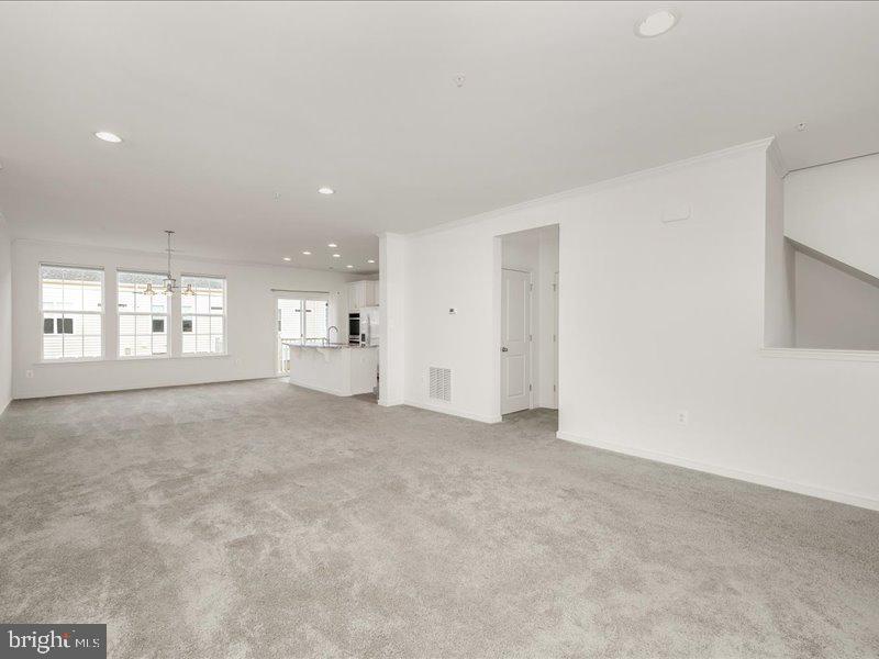 667 East Church Street, Unit B Frederick, MD 21701 - Photo 14 of 51 a view of an empty room with a window