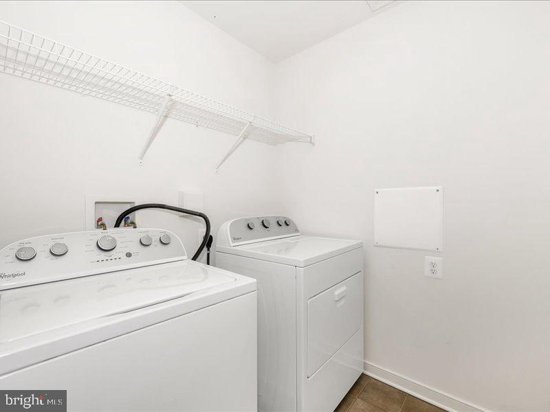 667 East Church Street, Unit B Frederick, MD 21701 - Photo 34 of 51 a utility room with dryer and washer