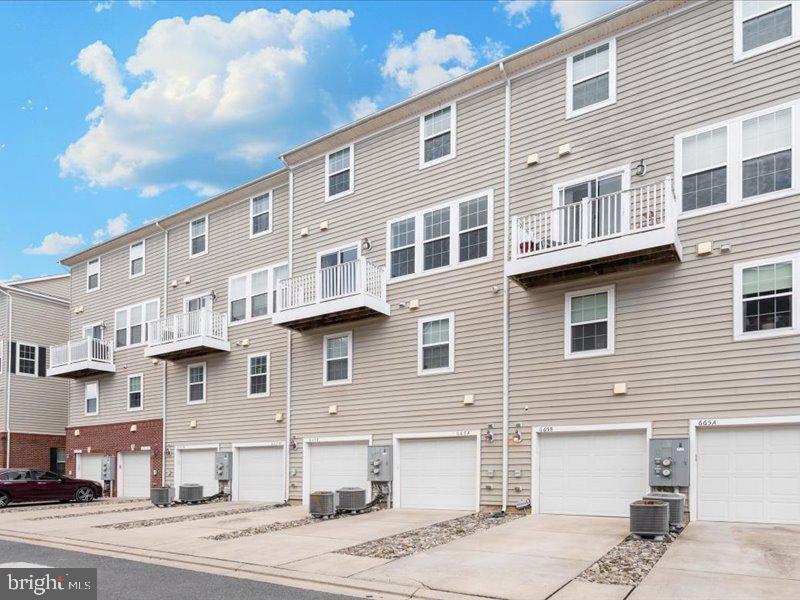 667 East Church Street, Unit B Frederick, MD 21701 - Photo 35 of 51 a front view of a building with a street