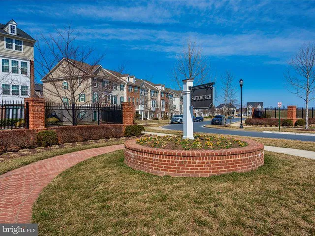 a view of swimming pool is middle in front of house