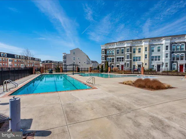 a view of outdoor space with playground and green space
