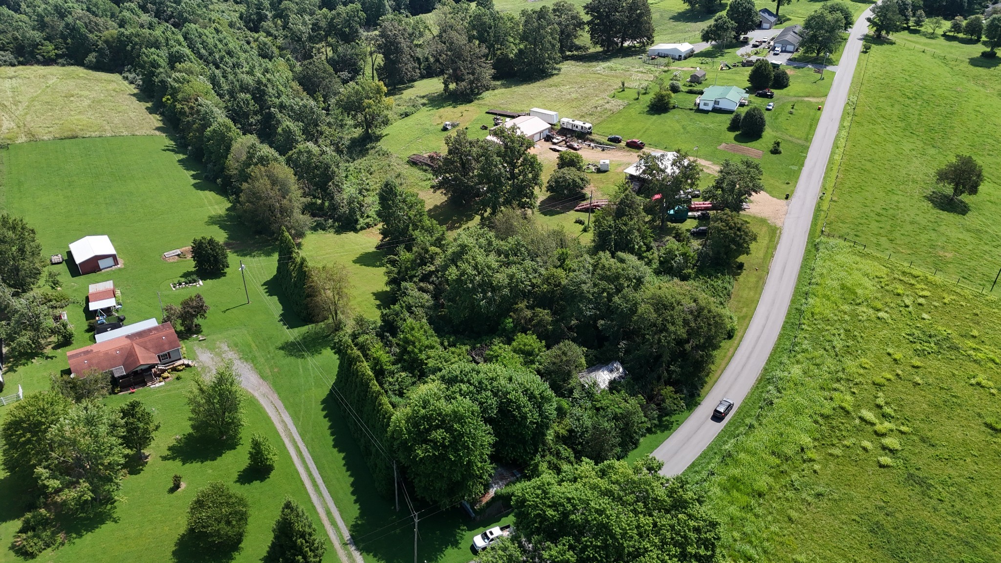 384 Underwood Road Lafayette, TN 37083 - Photo 4 of 8 an aerial view of a residential houses with outdoor space