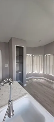 a view of a livingroom with a staircase