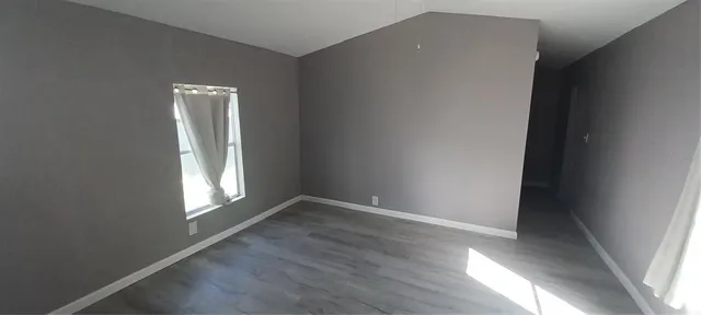 a view of a hallway view with staircase