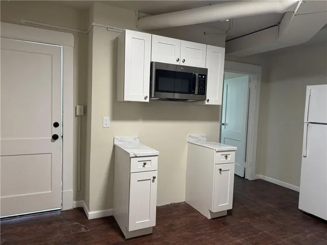 a room with storage and utility