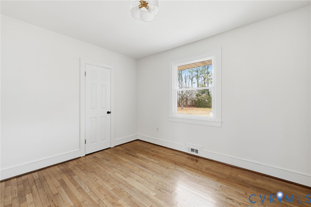 8202 Vaughan Road Petersburg, VA 23805 - Photo 15 of 31 an empty room with a window