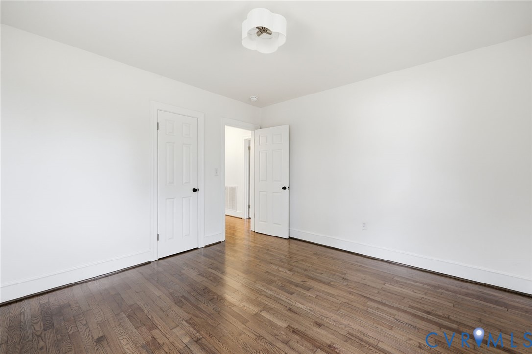 8202 Vaughan Road Petersburg, VA 23805 - Photo 26 of 31 a view of an empty room with wooden floor