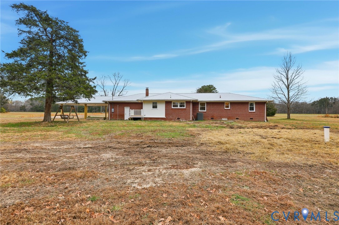8202 Vaughan Road Petersburg, VA 23805 - Photo 28 of 31 a front view of a house with a yard