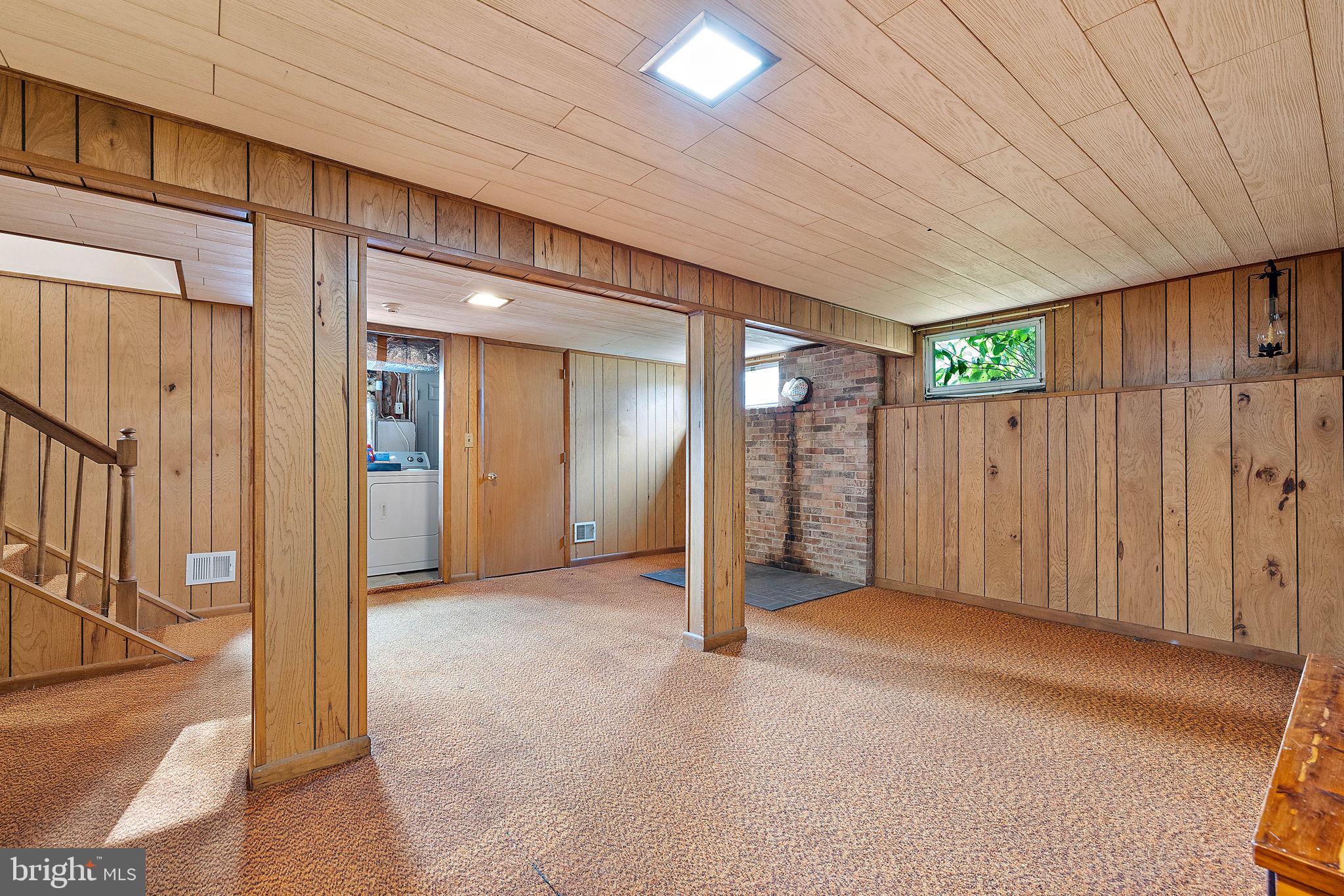 105 Eastfield Road Newark, DE 19713 - Photo 15 of 26 a view of a hallway with wooden shelves