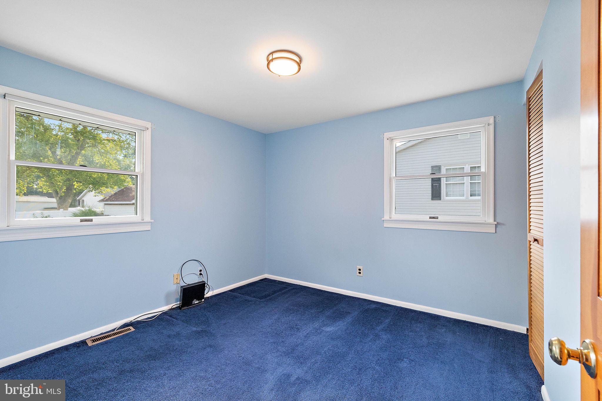 105 Eastfield Road Newark, DE 19713 - Photo 10 of 26 an empty room with a window