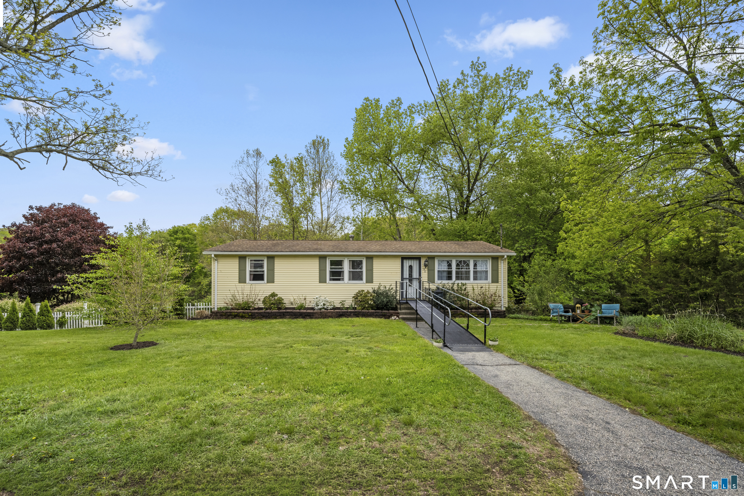 90 Sturtevant Street Norwich, CT 06360 - Photo 6 of 40 Ranch with large front yard and sidewalk to the front door