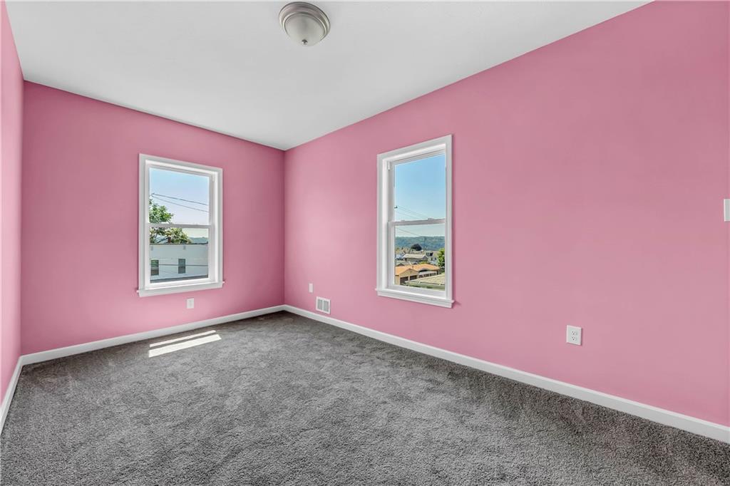522 Jefferson Street Rochester, PA 15074 - Photo 22 of 28 a view of a livingroom with a window