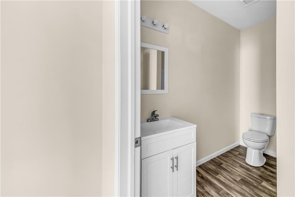 522 Jefferson Street Rochester, PA 15074 - Photo 24 of 28 a bathroom with a sink and a toilet