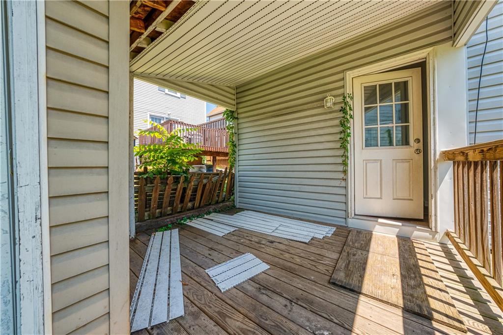 522 Jefferson Street Rochester, PA 15074 - Photo 25 of 28 a view of a balcony with wooden floor