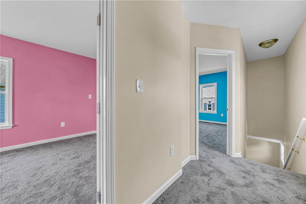 522 Jefferson Street Rochester, PA 15074 - Photo 26 of 28 a view of a livingroom with wooden floor and a bathroom