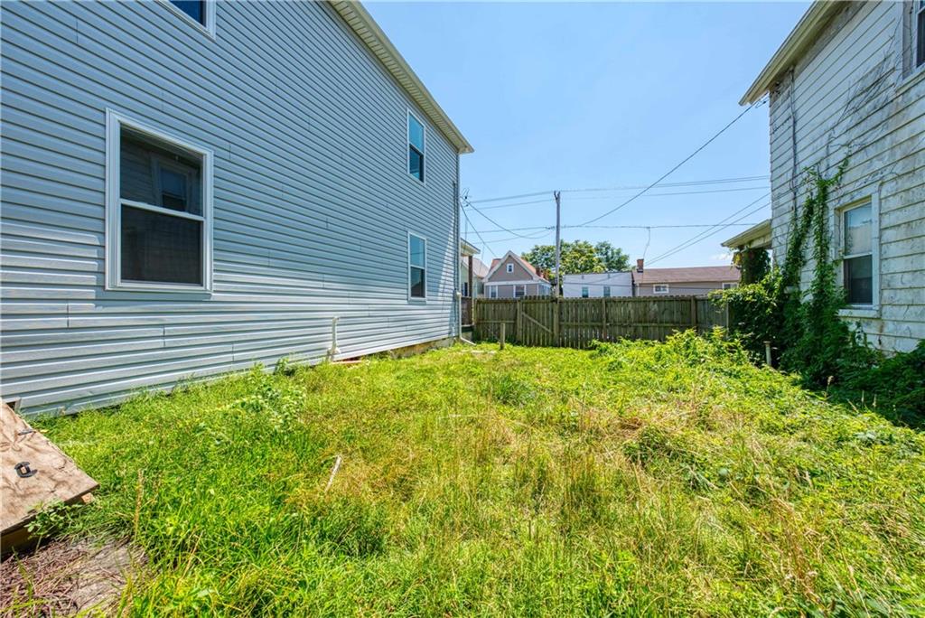 522 Jefferson Street Rochester, PA 15074 - Photo 27 of 28 a view of a house with a backyard