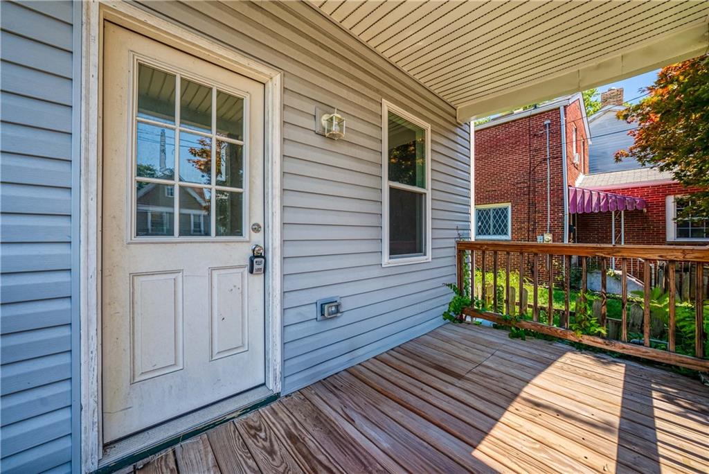 522 Jefferson Street Rochester, PA 15074 - Photo 3 of 28 a view of a house with a porch