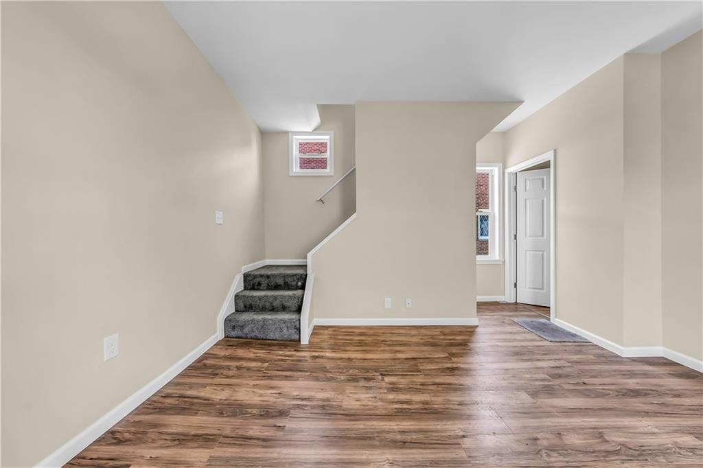 522 Jefferson Street Rochester, PA 15074 - Photo 8 of 28 a view of a livingroom with wooden floor