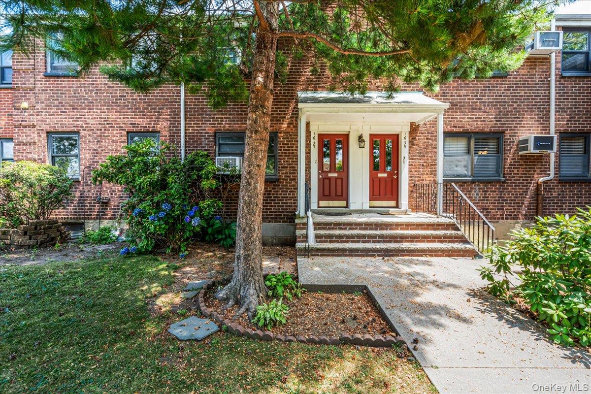 16-37 Utopia Parkway, Unit 233 Queens, NY 11357 - Photo 1 of 16 Property entrance featuring brick siding