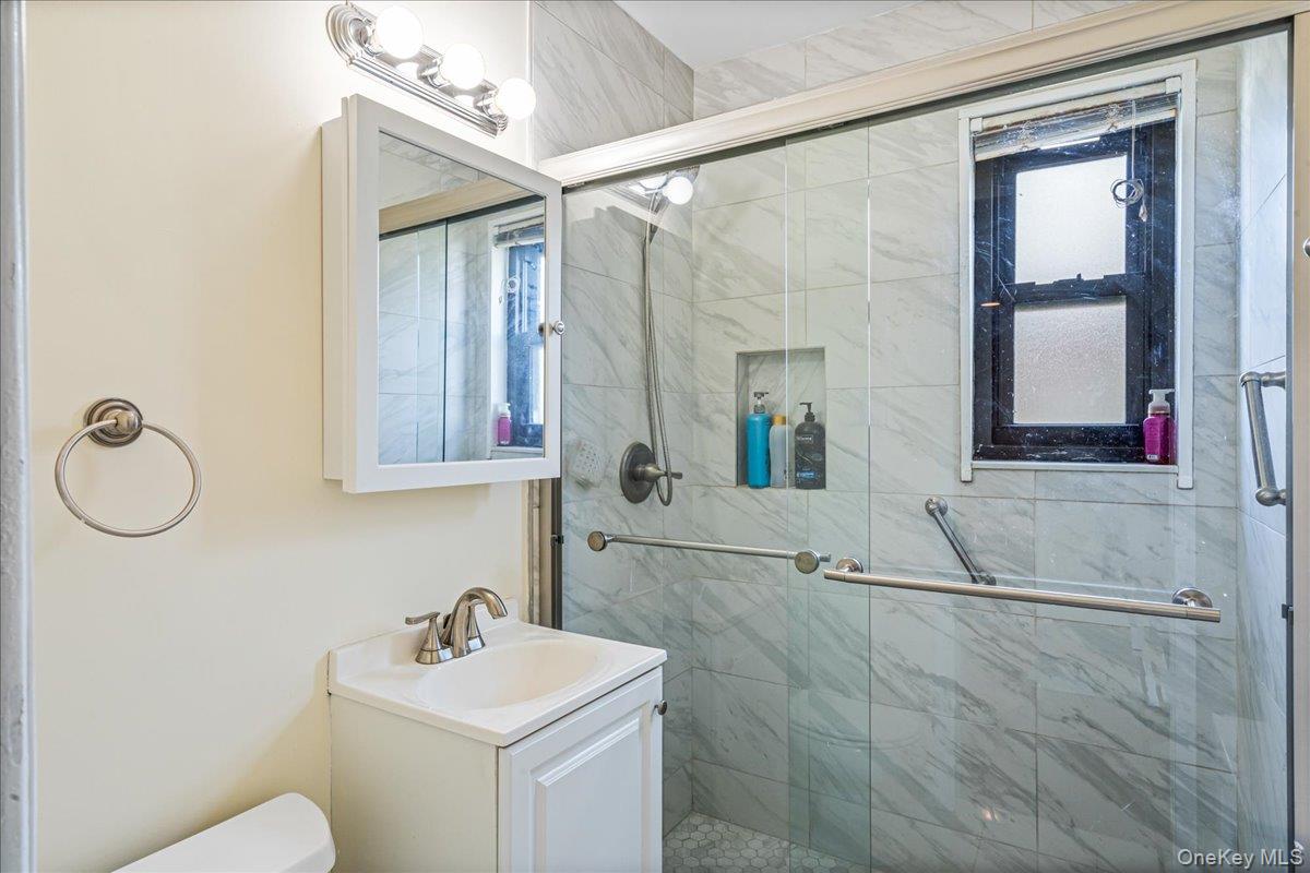 16-37 Utopia Parkway, Unit 233 Queens, NY 11357 - Photo 14 of 16 Bathroom with shower stall