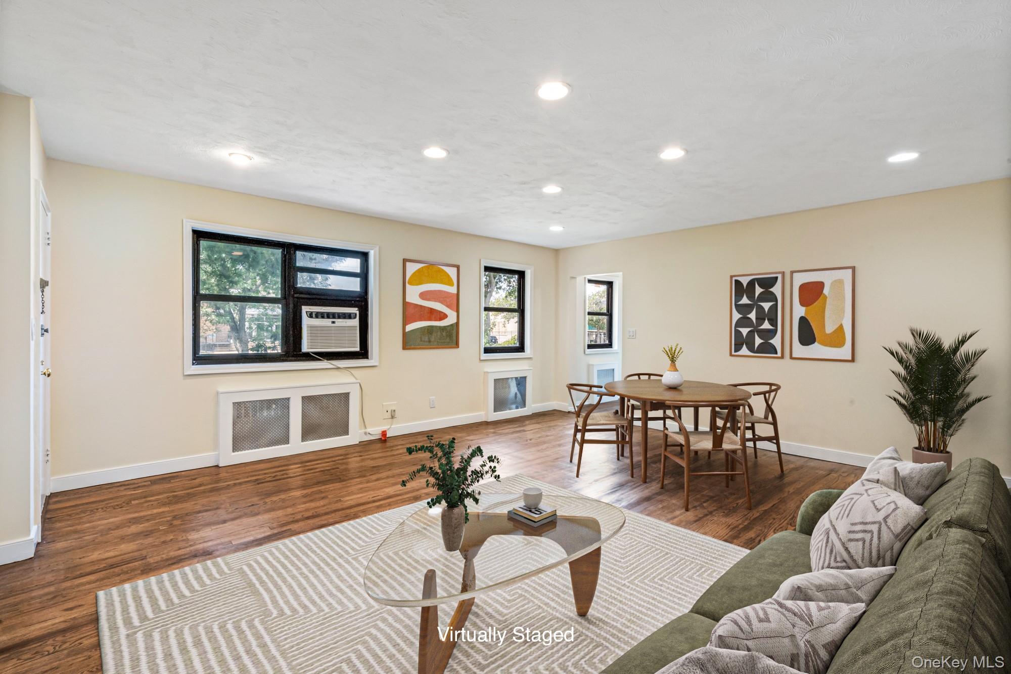 16-37 Utopia Parkway, Unit 233 Queens, NY 11357 - Photo 2 of 16 Virtually Staged Living Room