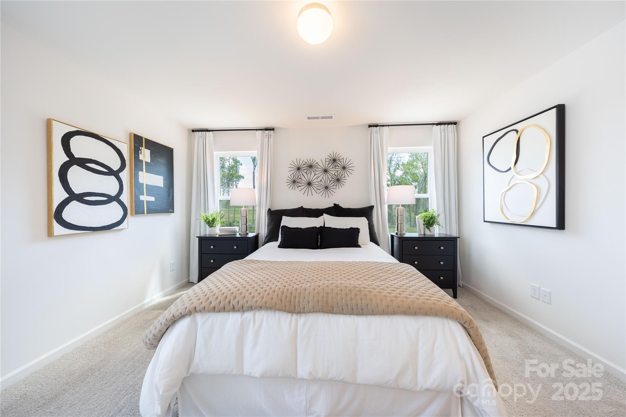 3014 Springvale Street, Unit 21 Charlotte, NC 28208 - Photo 10 of 12 a bedroom with a bed and a window
