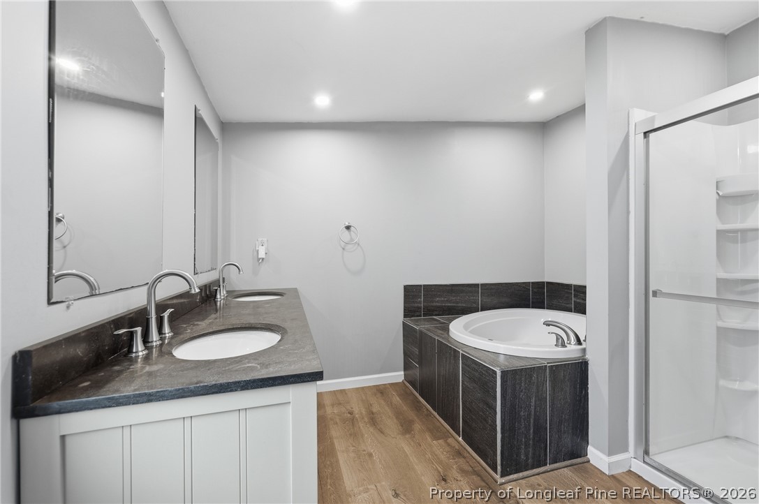 78 Georgia Way Cameron, NC 28326 - Photo 11 of 21 a bathroom with a granite countertop sink and a mirror