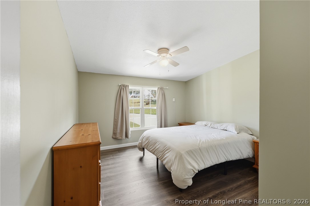 78 Georgia Way Cameron, NC 28326 - Photo 13 of 21 a bedroom with a bed and a window