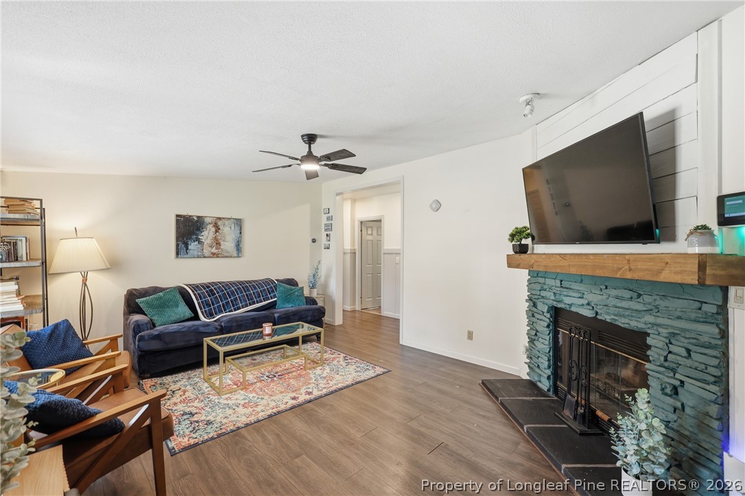 78 Georgia Way Cameron, NC 28326 - Photo 3 of 21 a living room with furniture and a flat screen tv