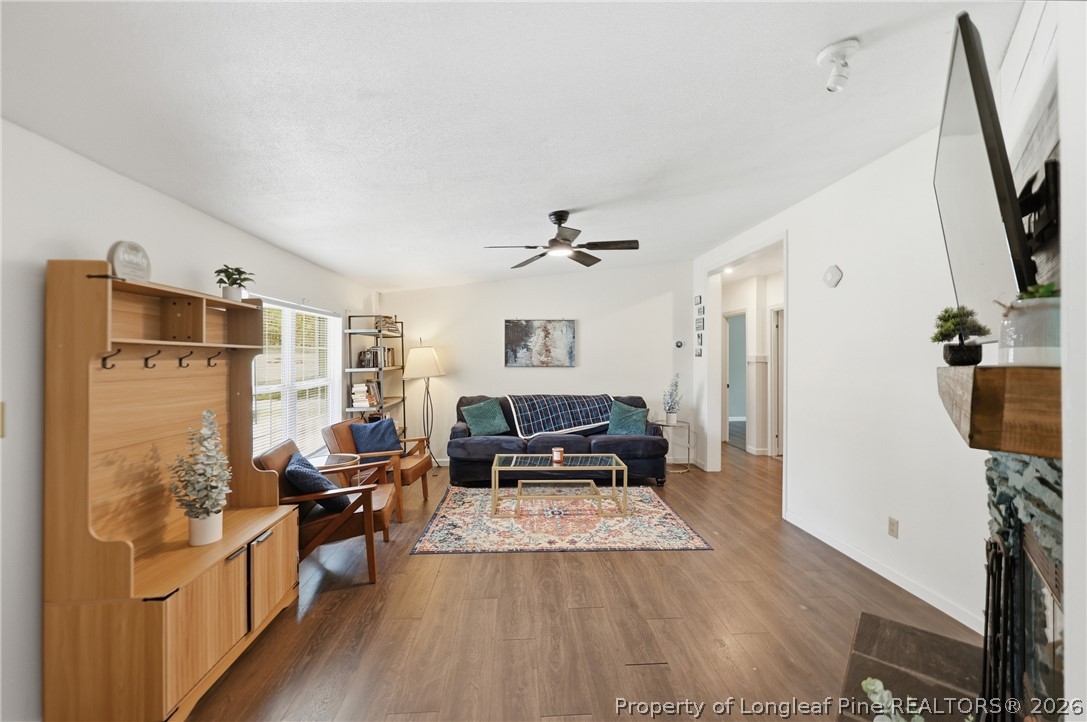78 Georgia Way Cameron, NC 28326 - Photo 4 of 21 a living room with furniture and a flat screen tv