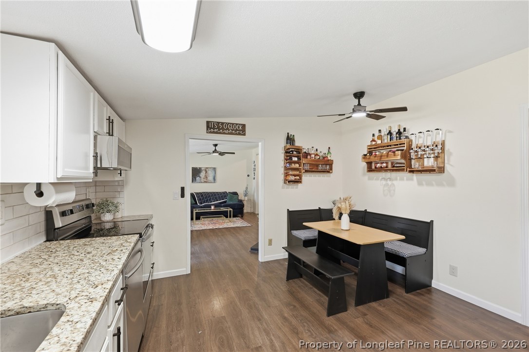 78 Georgia Way Cameron, NC 28326 - Photo 8 of 21 a living room with furniture and a wooden floor