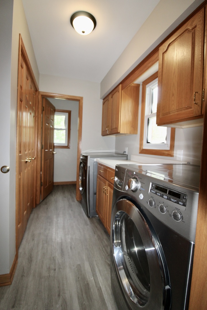 1505 Pheasant Run Road Harvard, IL 60033 - Photo 29 of 30 a utility room with closet dryer and washer