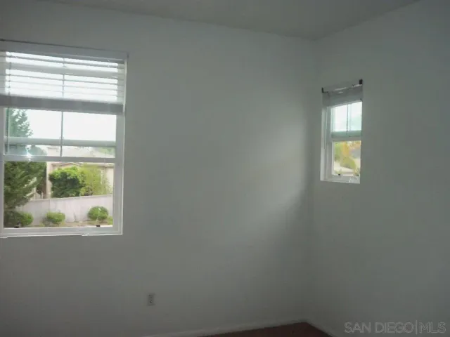 a view of window in an empty room