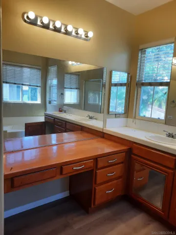 a room with cabinets and window