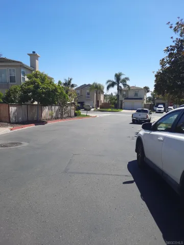 a view of a street with cars