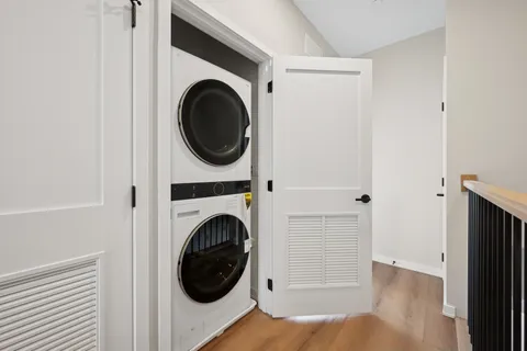 a close view of a utility room with dryer and washer