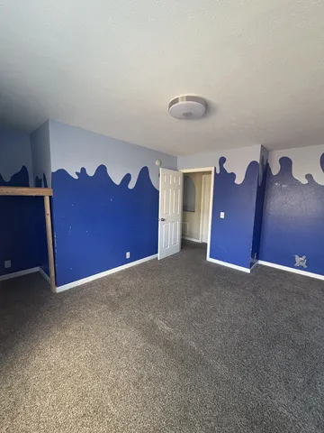 a view of a livingroom with a dresser