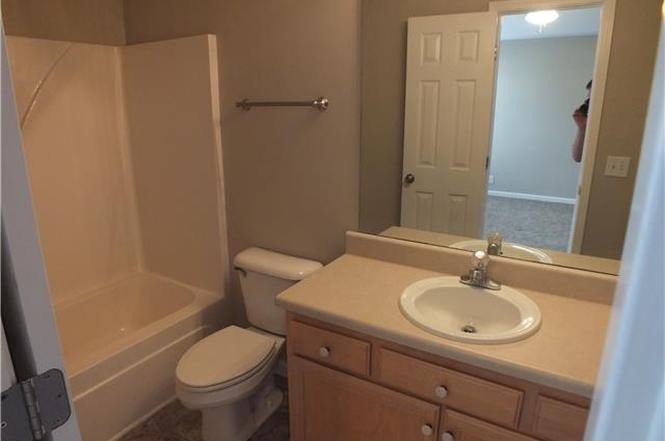 4112 Nir Shreibman Boulevard La Vergne, TN 37086 - Photo 10 of 24 a bathroom with a sink toilet and shower