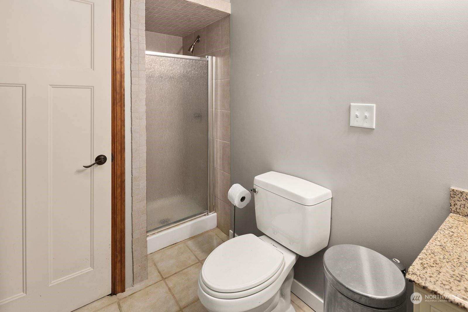 23211 3rd Avenue Southeast Bothell, WA 98021 - Photo 24 of 40 a white toilet sitting next to a bathroom sink