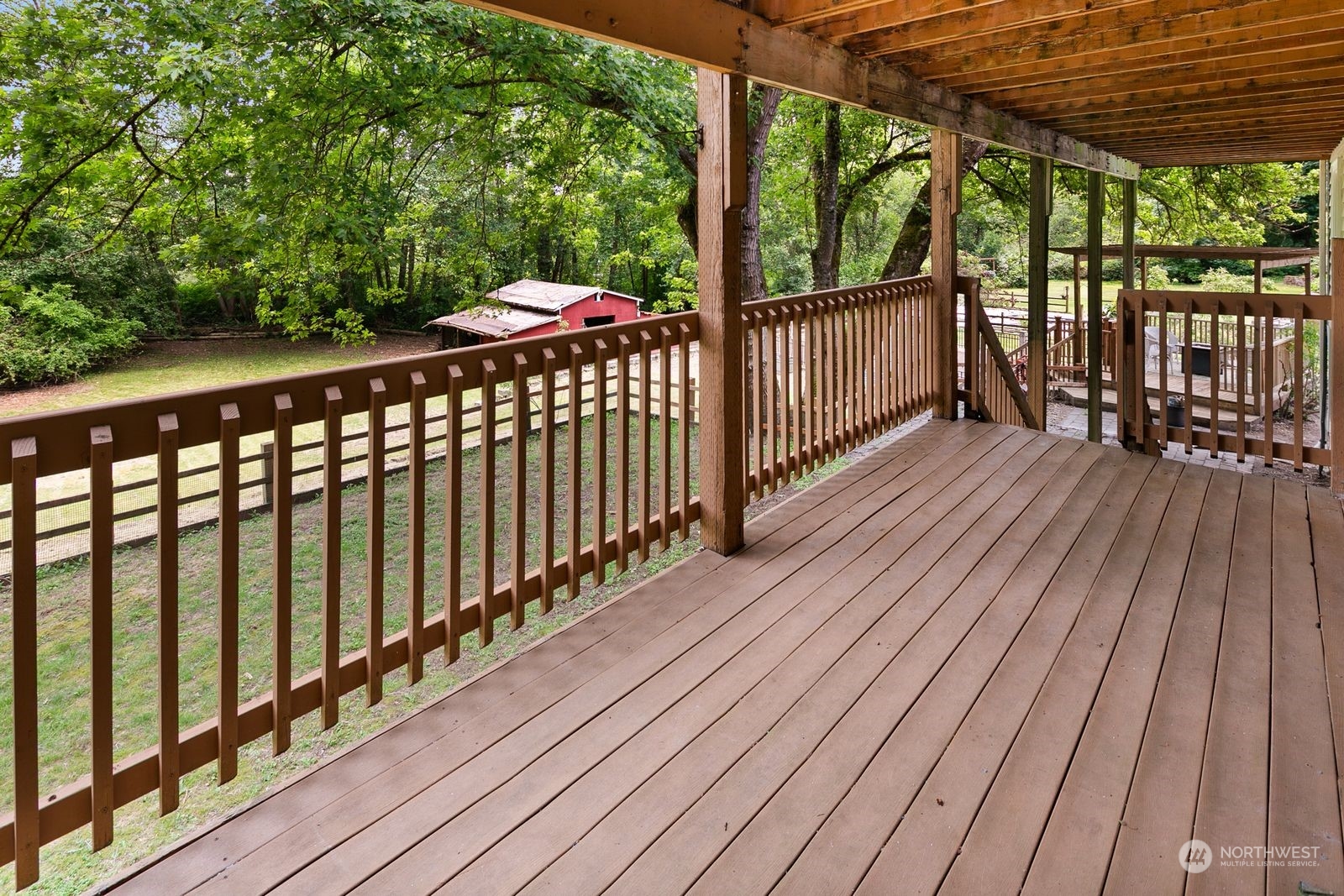 23211 3rd Avenue Southeast Bothell, WA 98021 - Photo 26 of 40 a balcony with wooden floor in outdoor space