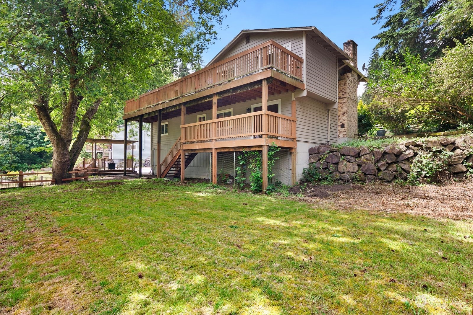 23211 3rd Avenue Southeast Bothell, WA 98021 - Photo 29 of 40 a view of a house with a yard