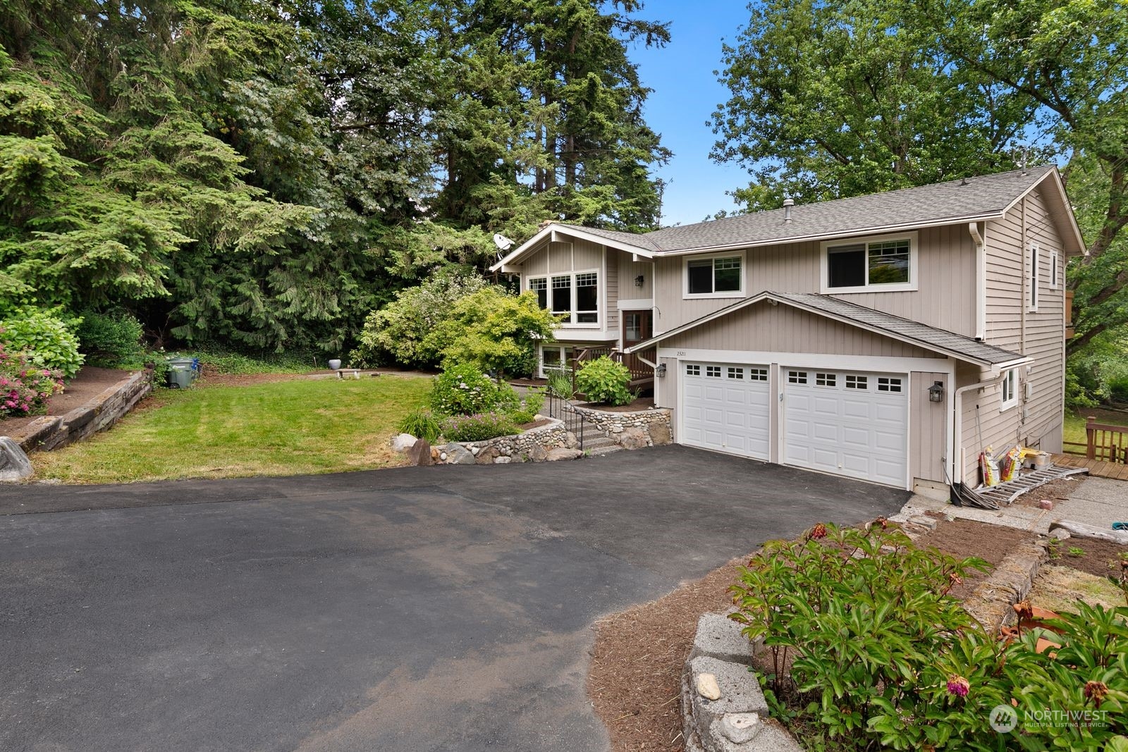 23211 3rd Avenue Southeast Bothell, WA 98021 - Photo 3 of 40 a view of a house with a yard and large tree
