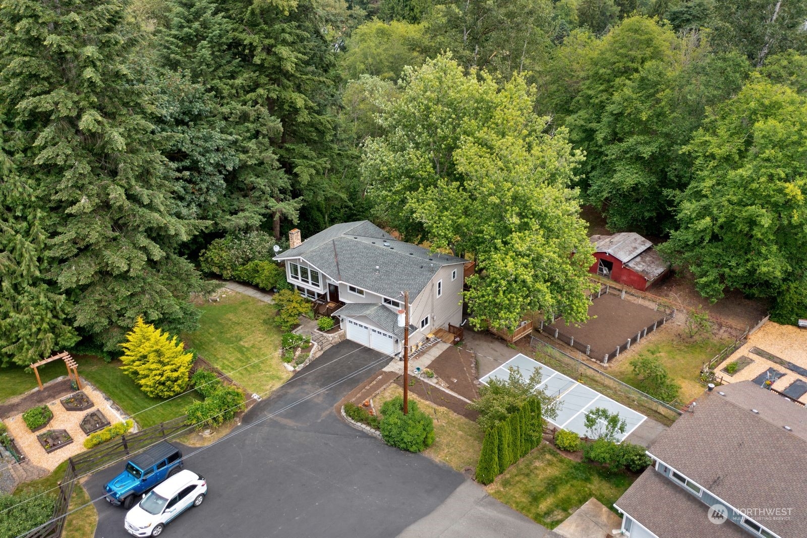 23211 3rd Avenue Southeast Bothell, WA 98021 - Photo 38 of 40 an aerial view of a house with a yard basket ball court and a fire pit