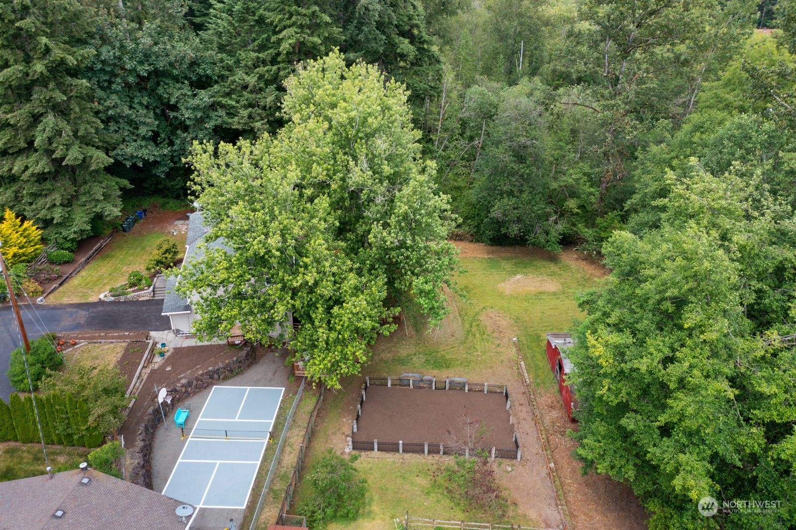 23211 3rd Avenue Southeast Bothell, WA 98021 - Photo 39 of 40 an aerial view of a house with a yard lake and outdoor seating
