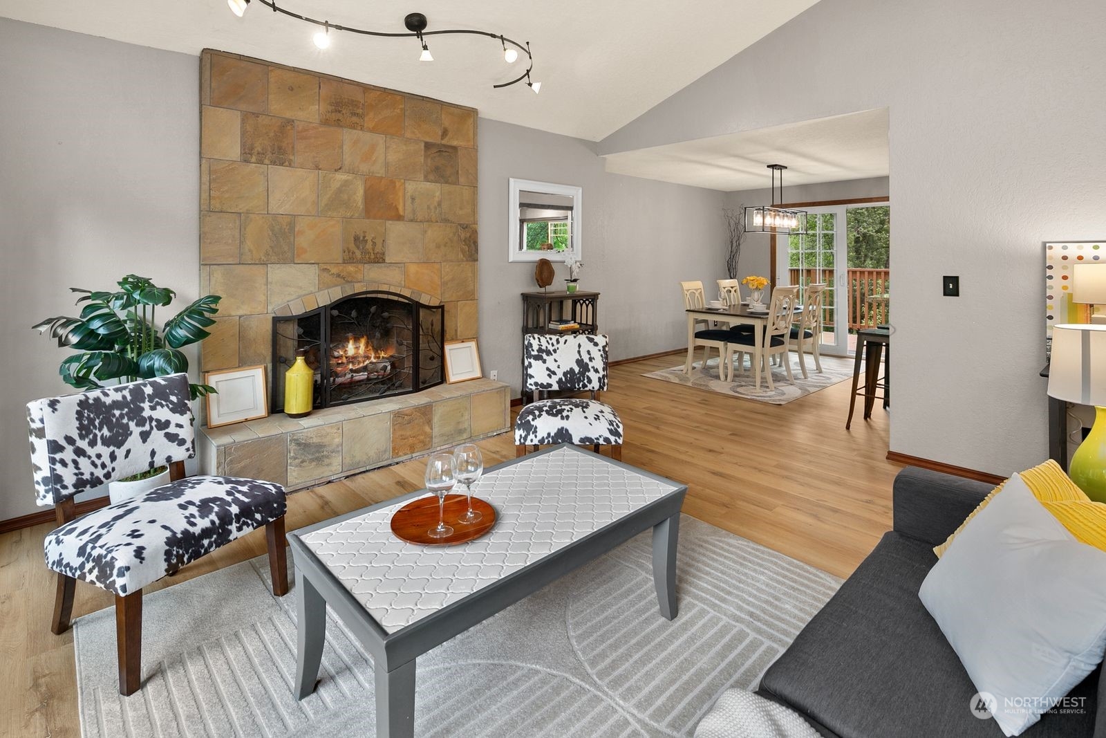 23211 3rd Avenue Southeast Bothell, WA 98021 - Photo 8 of 40 a living room with furniture and a fireplace