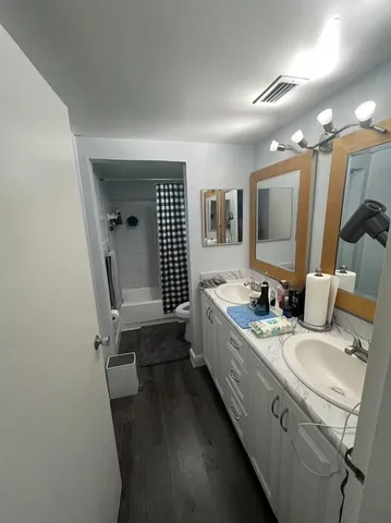 a view of a glass door and the balcony