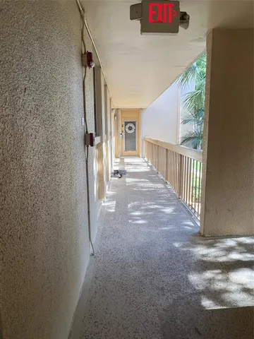$215,000 | 8437 Forest Hills Drive, Unit 203, Coral Springs, FL 33065